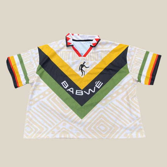 Vintage Zimbabwean soccer jersey featuring national colors and retro design – inspired by classic 90s football culture."